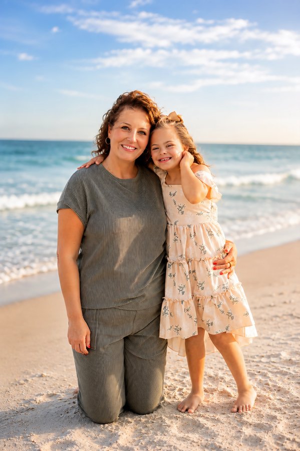 Sarah Gore with her daughter at the beach